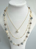 Triple Chain Faux Pearl Necklace With Love Writing And Floral Element