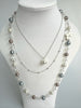 Triple Chain Faux Pearl Necklace With Love Writing And Floral Element