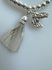 Beaded Alloy Bracelet With Dangling Creature And Tassel