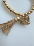 Beaded Silvery Alloy Bracelet With Dangling Heart And Tassel