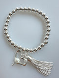 Beaded Silvery Alloy Bracelet With Dangling Heart And Tassel