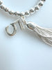 Beaded Alloy Bracelet With Dangling Bits