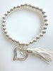 Beaded Silvery Alloy Bracelet With Dangling Heart And Tassel