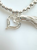 Beaded Silvery Alloy Bracelet With Dangling Heart And Tassel
