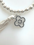 Beaded Alloy Bracelet With Dangling Bits