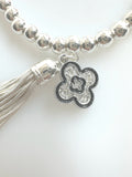 Beaded Alloy Bracelet With Dangling Bits