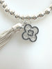 Beaded Alloy Bracelet With Dangling Bits