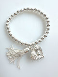 Beaded Silvery Bracelet With Dangling Wing And Tassel