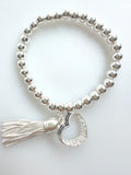 Beaded Silvery Alloy Bracelet With Dangling Heart And Tassel