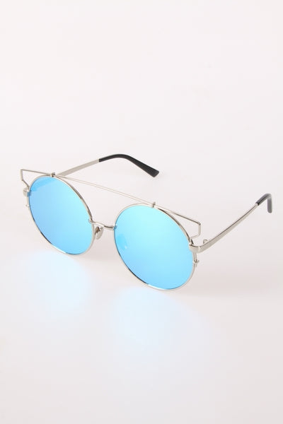 Round Sunglasses with darker tint in light frame