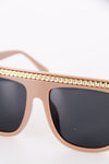 nude chain detail flat top sunglasses close up